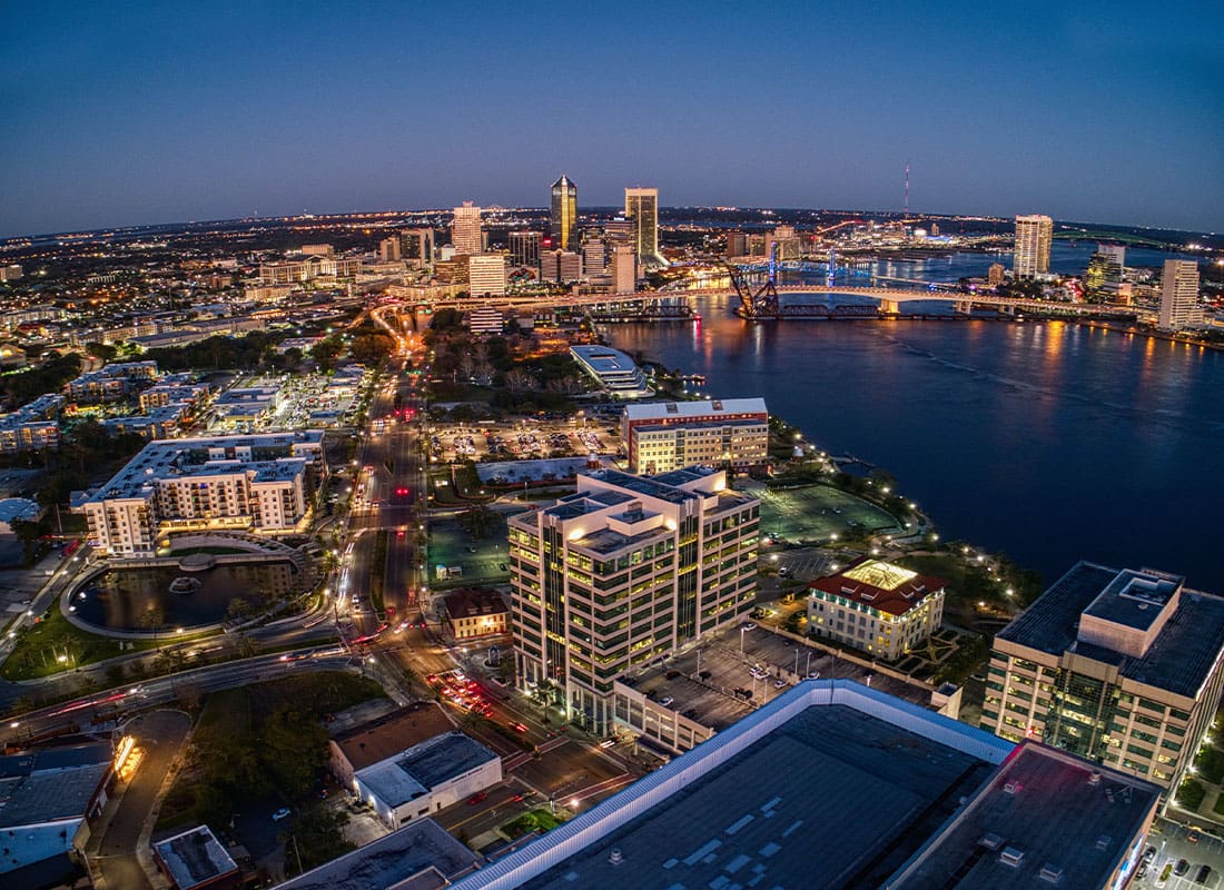 Jacksonville, FL - Aerial View of Jacksonville, Florida in Winter at Sunset as the City Lights Up