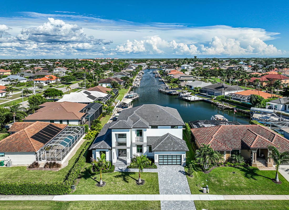 Middleburg, FL - Luxury Real Estate Drone Shot on Marco Island Florida Over Looking a Storm Cloud Headed Their Way